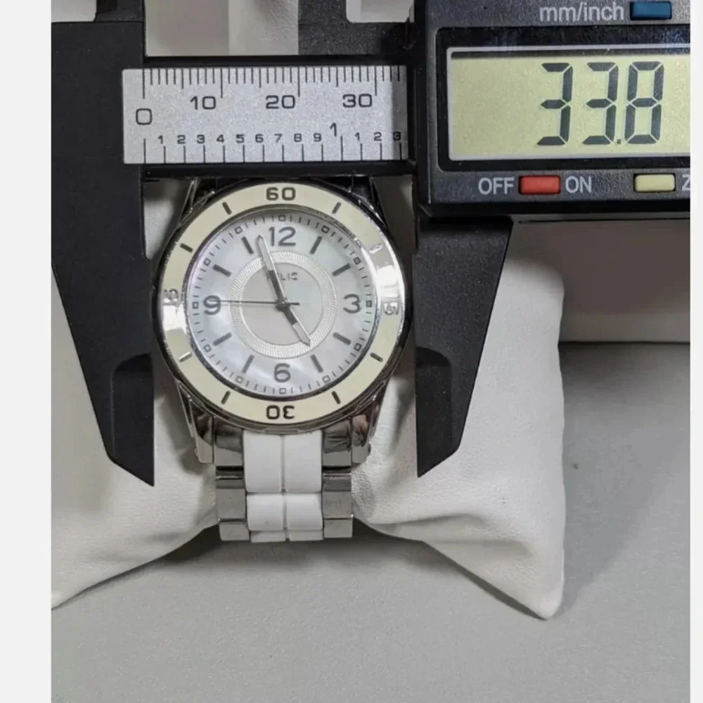 Relic Pearlized Dial White Bezel Round Silver Tone Case Link Bracelet Band Watch
